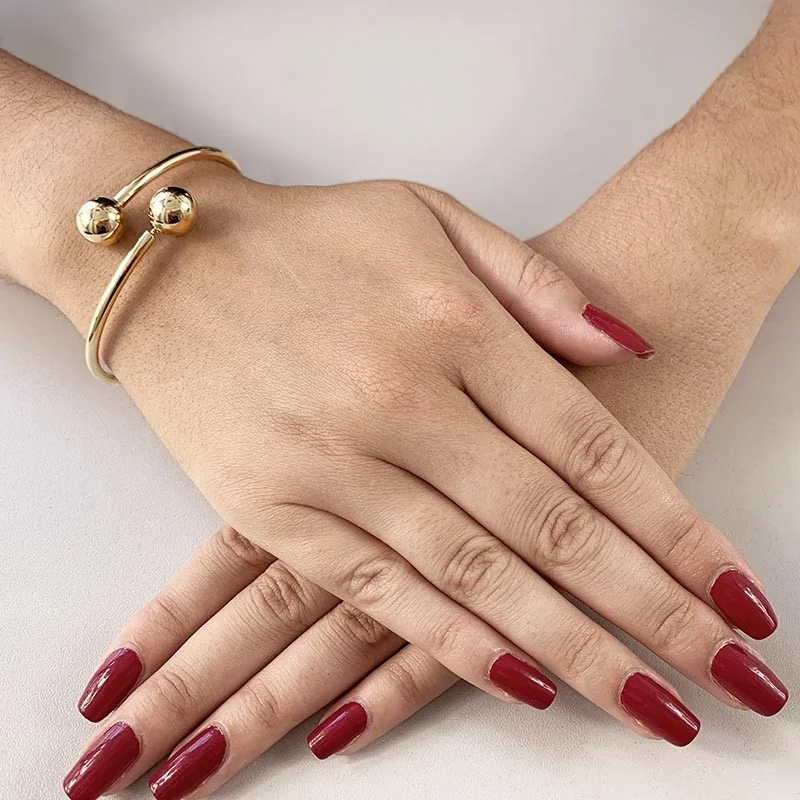 Zlatý náramek bangle s kuličkami ryzost 375