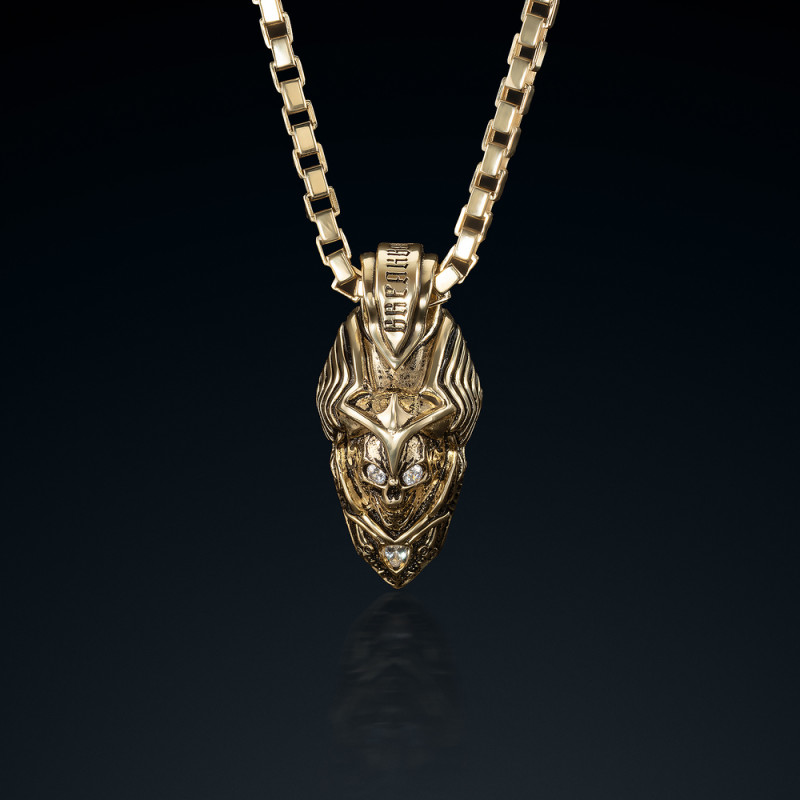 Tento unikátní přívěsek BREAKBOYZ Skull Angel of death ze zlata 14k ztělesňuje samotnou smrt s detaily inspirovanými egyptskými 