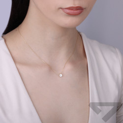 Elegantní zlatý náhrdelník s laboratorním diamantem 0,58 ct a certifikátem IGI. Ideální dárek k zásnubám či výročí. Objevte luxu