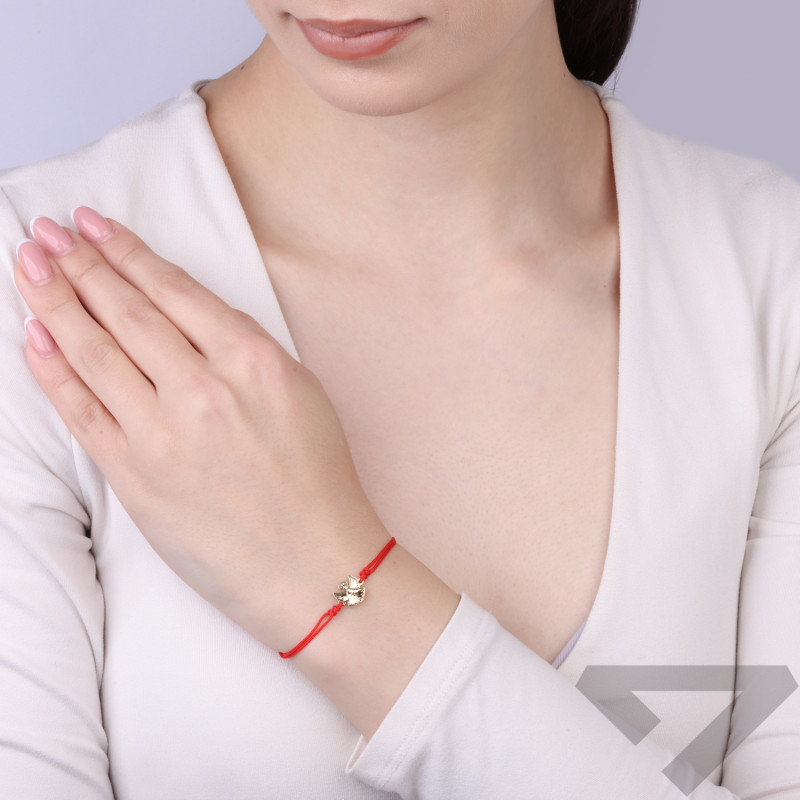 Náramek z červené šňůrky se zlatým andělíčkem ryzosti 585