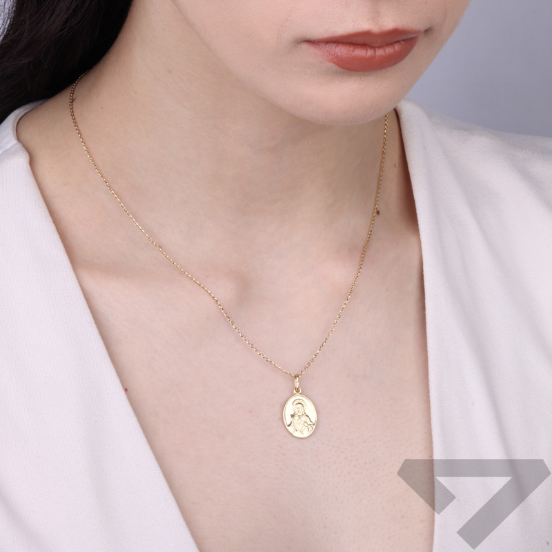 Zlatý medailon se škapulířem, ryzost 585. Elegantní náboženský šperk s vyobrazením Matky Boží a Ježíše. Rozměry: 16x13 mm. Řetíz