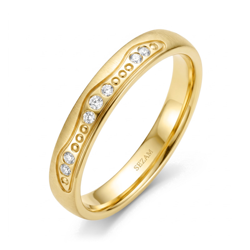 Objevte snubní prsten ze zlata ryzosti 375 s 7 diamanty o celkové váze 0,0375 ct. Včetně gravírování a balení zdarma. Kupte nyní